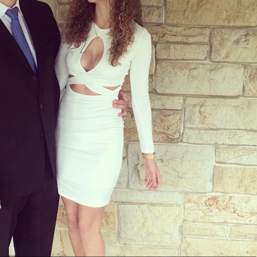 Tight white dress with cut outs